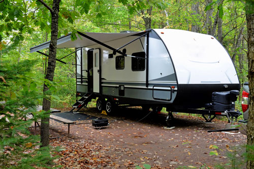 Photo of RV camping in the woods